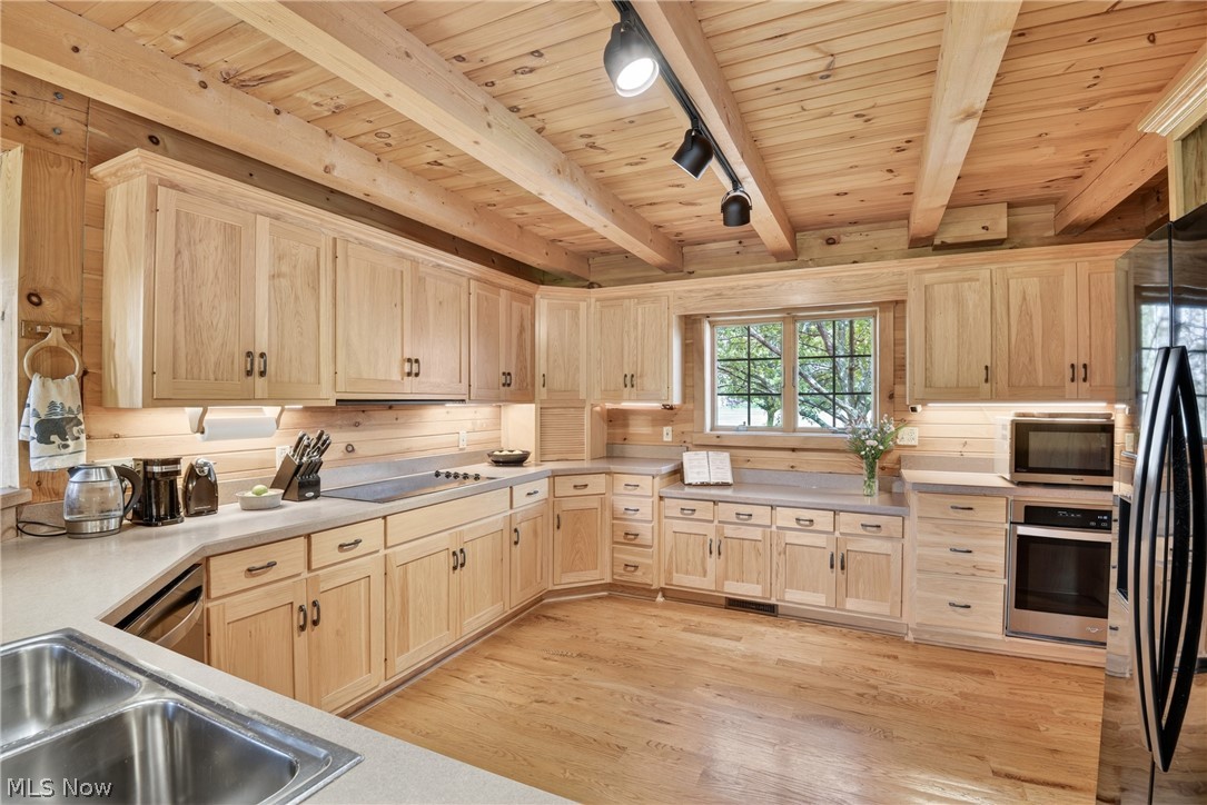 16727 Pitts Road Wellington, OH 44090 - Photo 10 of 50 Fully equipped Kitchen with solid hickory cabinets