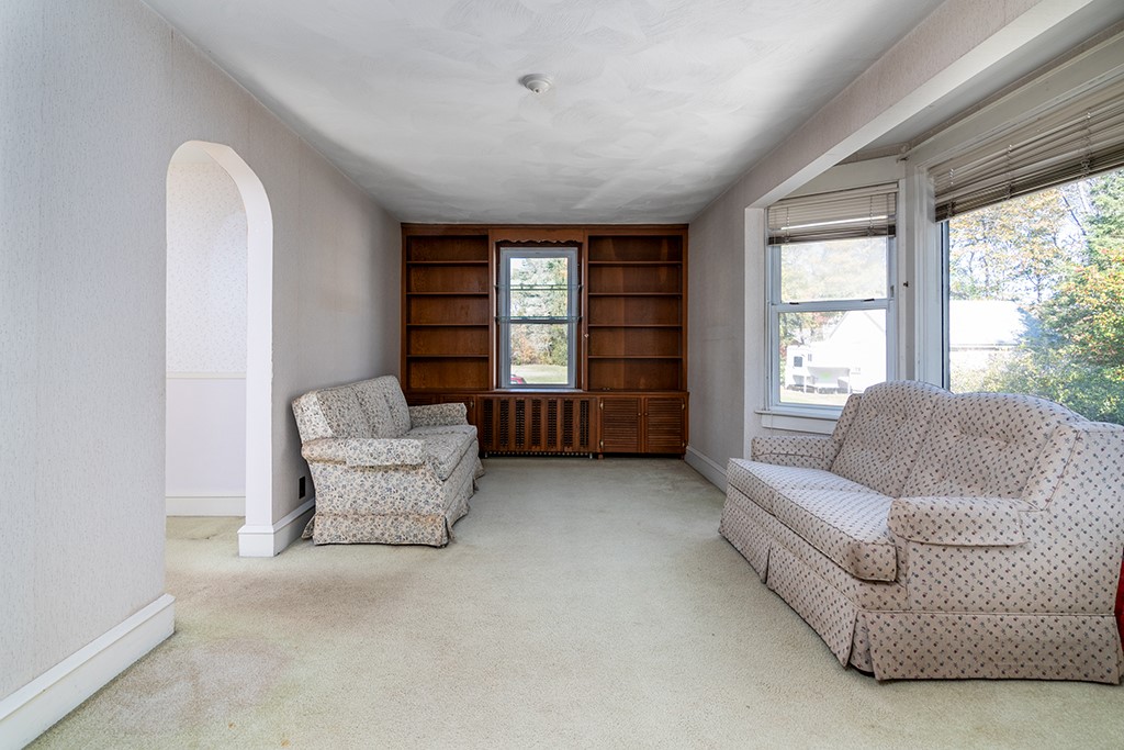 154 Essex Road North Kingstown, RI 02852 - Photo 16 of 28 LIVING ROOM WITH BUILT IN BOOKCASE