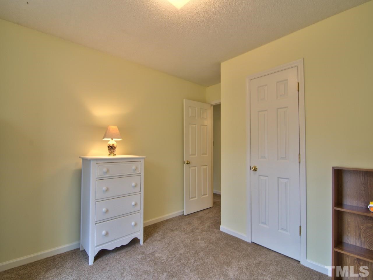 5701 Geoffrey Road Durham, NC 27712 - Photo 11 of 23 a view of room with cabinet