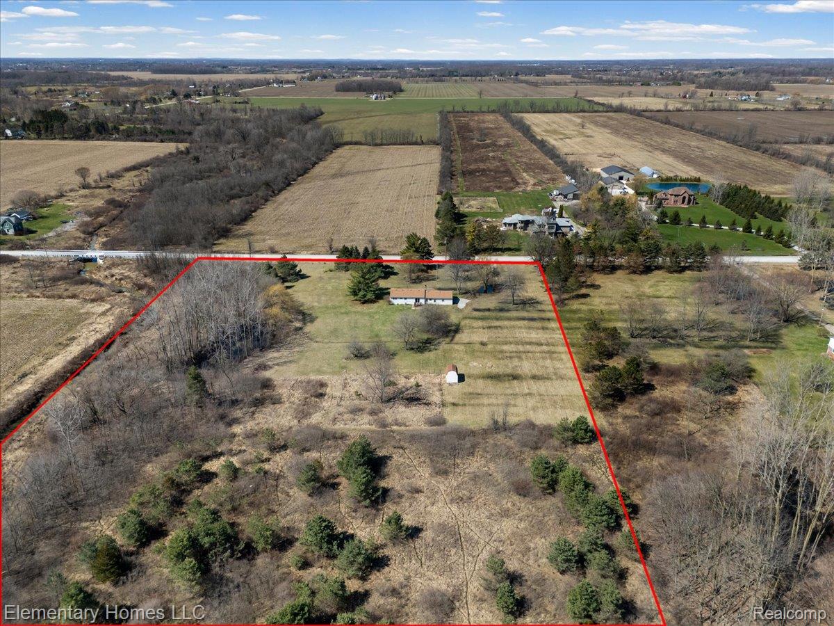 1650 Cove Road Goodells, MI 48027 - Photo 7 of 49 Aerial view of sparsely populated area featuring property boundaries highlighted and abundant farmland