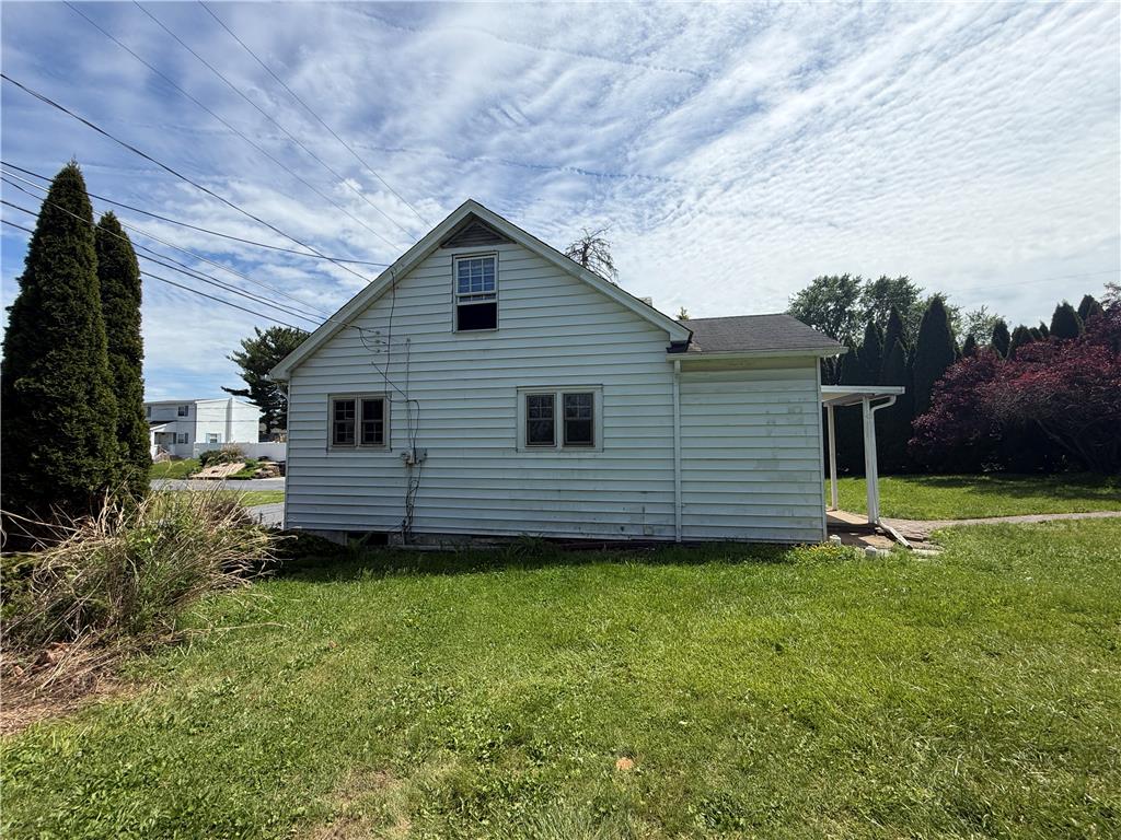 3051 Keystone Street Bethlehem, PA 18020 - Photo 2 of 18 A classic white-sided residence with a covered porch, set on a verdant lot.