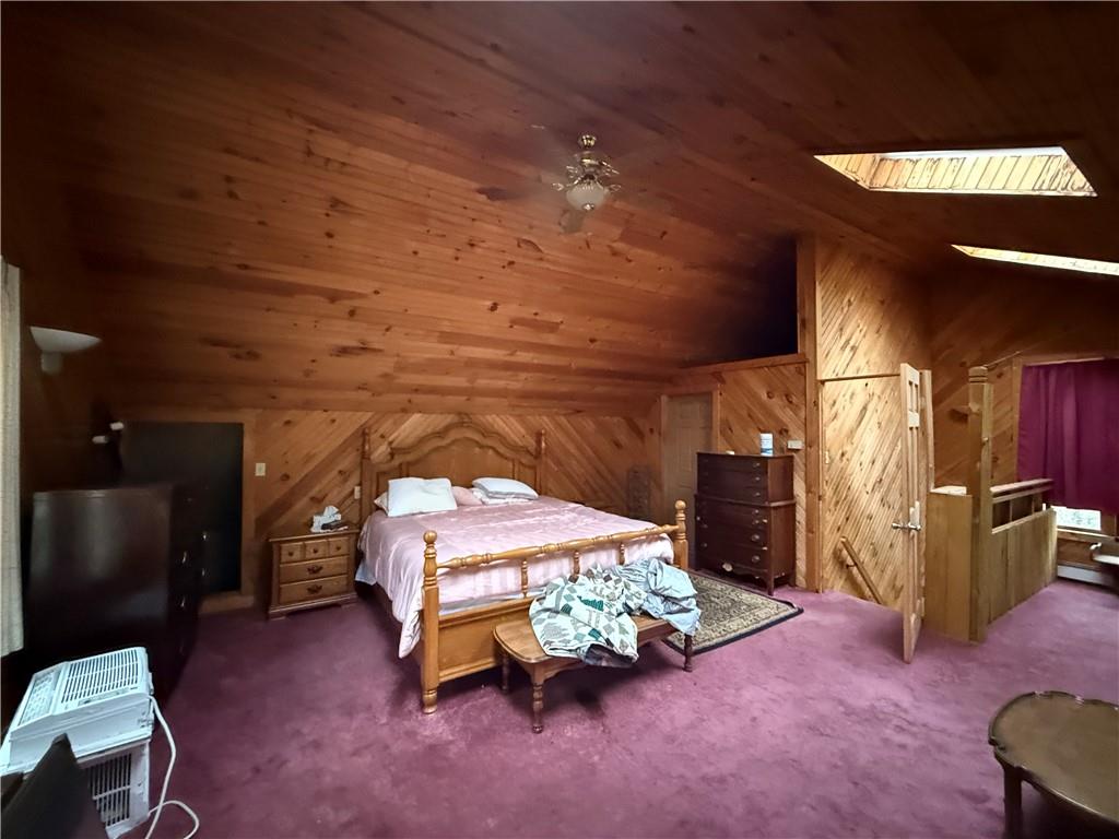 1006-1008 Olive Avenue Natrona Heights, PA 15065 - Photo 11 of 26 a bedroom with bed and a couch