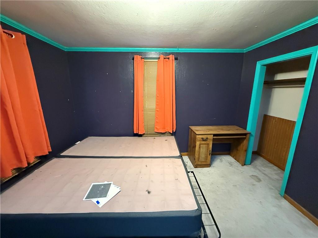 1006-1008 Olive Avenue Natrona Heights, PA 15065 - Photo 17 of 26 a room with a table and chairs