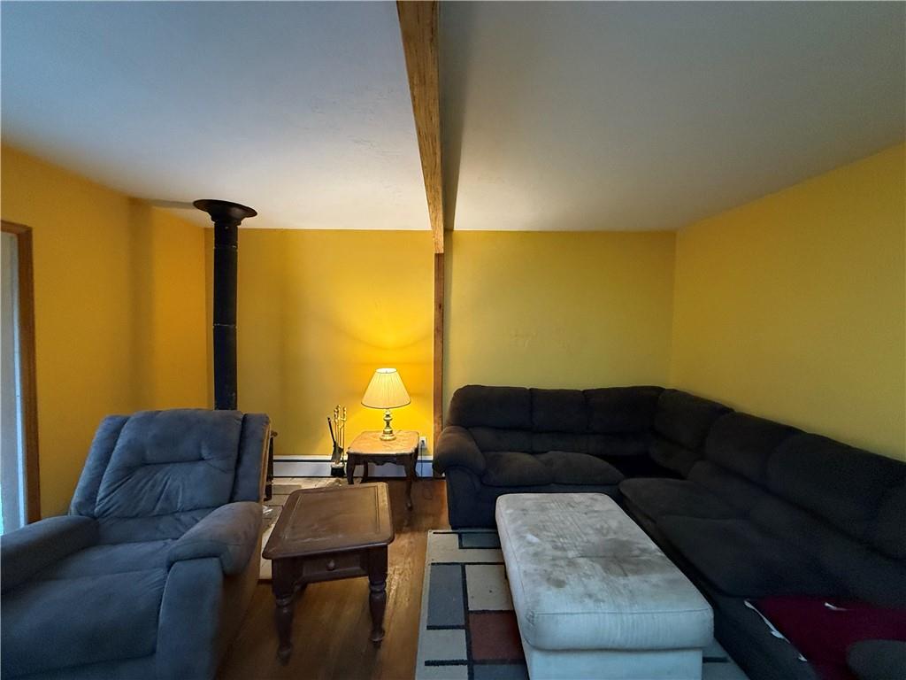 1006-1008 Olive Avenue Natrona Heights, PA 15065 - Photo 2 of 26 a living room with furniture and a couch