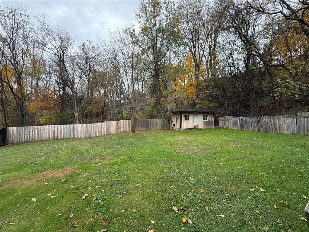 1006-1008 Olive Avenue Natrona Heights, PA 15065 - Photo 26 of 26 a view of a yard with a trampoline