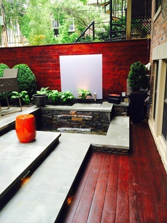 98 Waltham Street, Unit 1 Boston, MA 02118 - Photo 25 of 26 a view of a chairs and table in the balcony