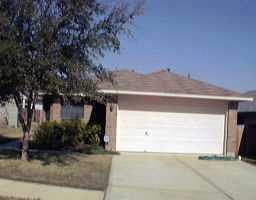 8917 Vigen Circle Austin, TX 78748 - Photo 1 of 1 a view of a house with a yard and garage