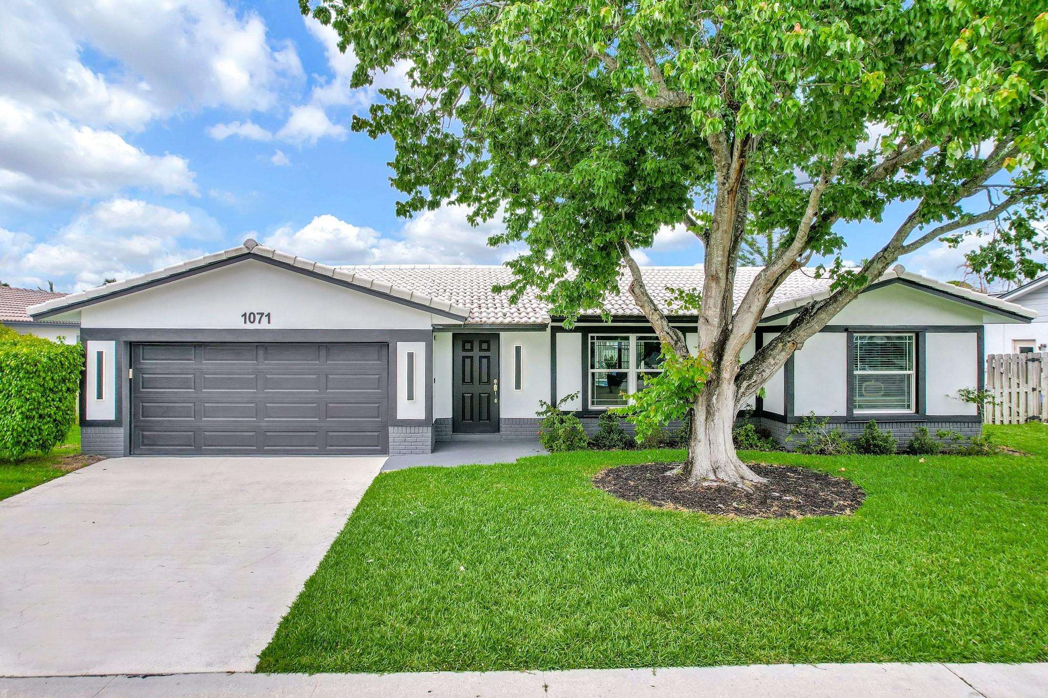 1071 Northwest 8th Street Boca Raton, FL 33486 - Photo 1 of 33 Photo 1