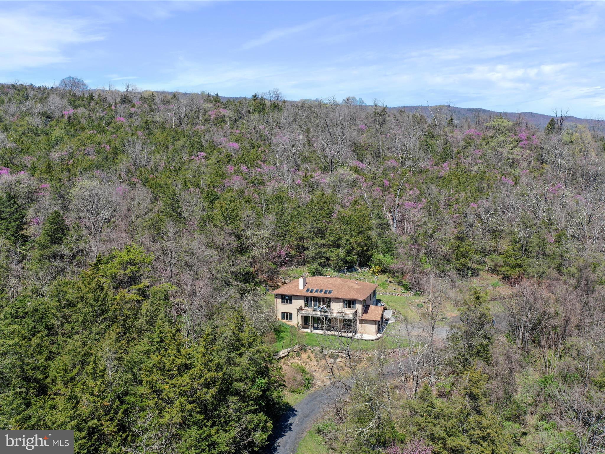 1639 Sugar Hill Road Maurertown, VA 22644 - Photo 13 of 57 an aerial view of a house with mountain view