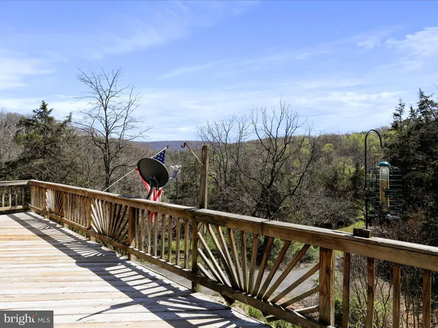 a view of a balcony with mountain view