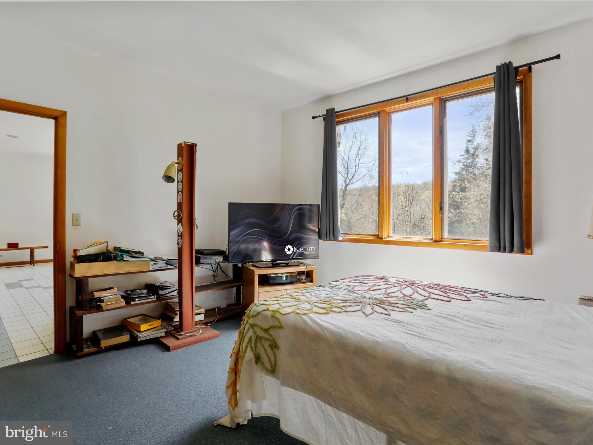 1639 Sugar Hill Road Maurertown, VA 22644 - Photo 36 of 57 a bedroom with bed and a window