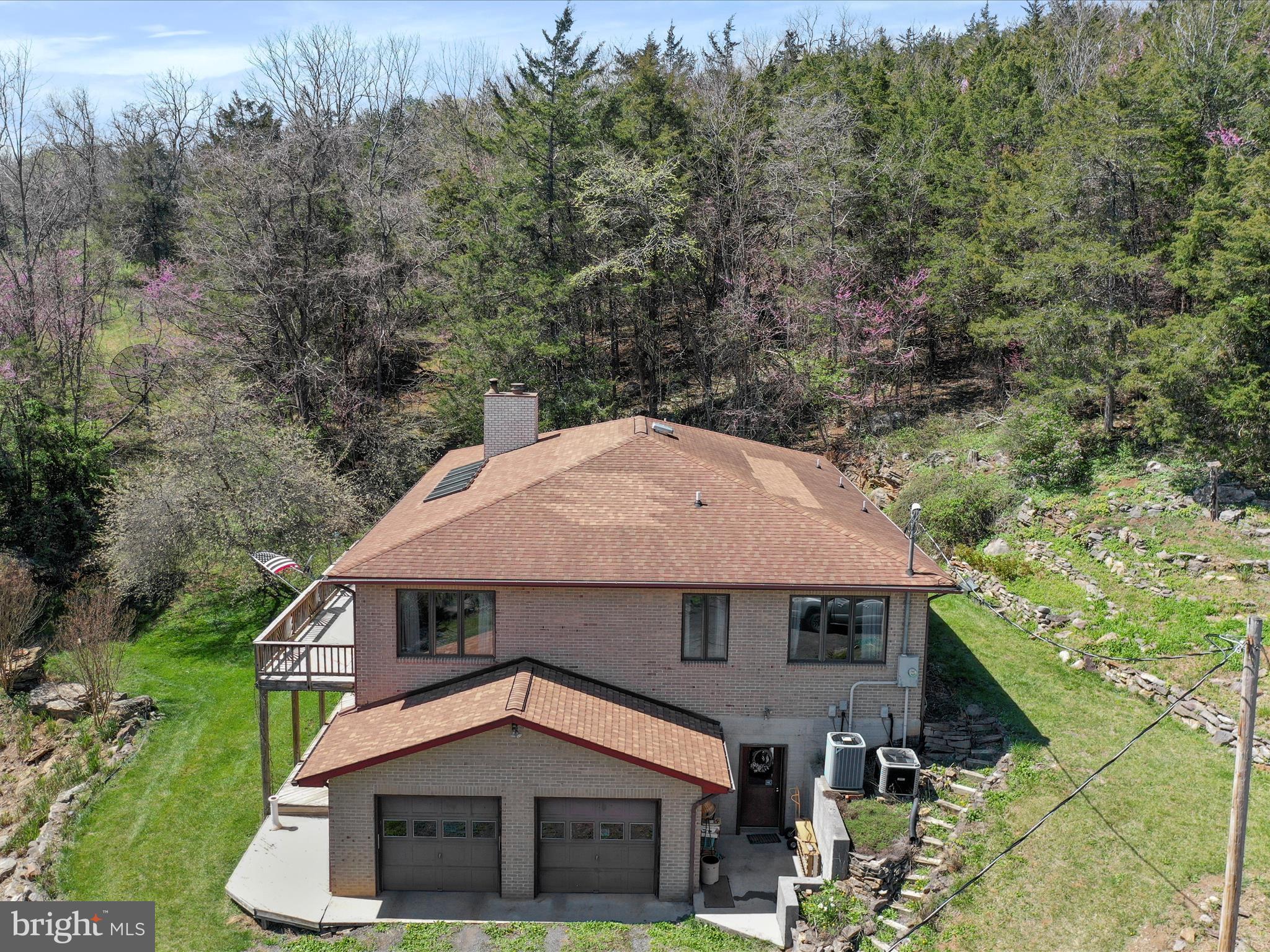 1639 Sugar Hill Road Maurertown, VA 22644 - Photo 4 of 57 an aerial view of a house with a yard