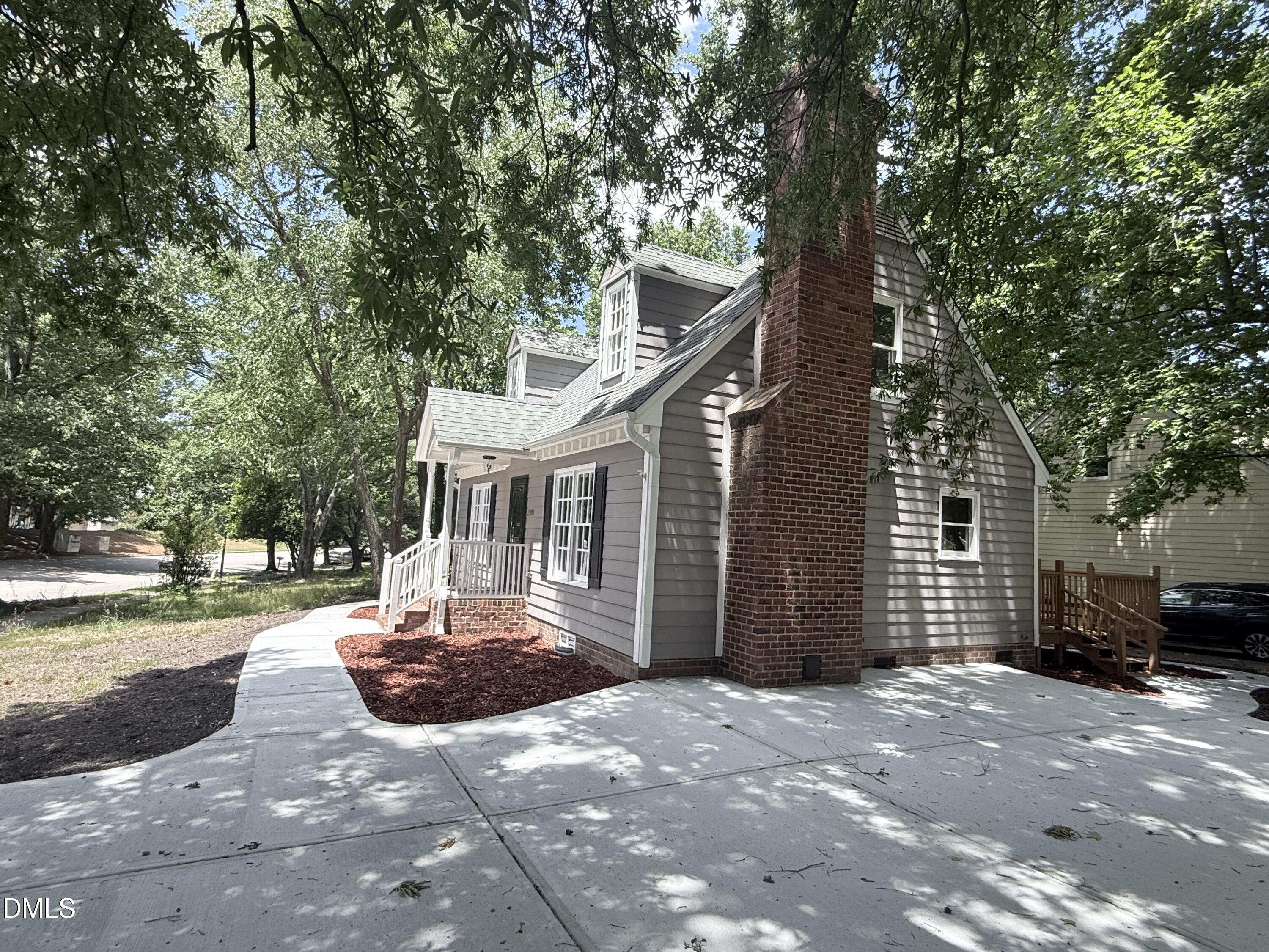 2900 Broadlands Drive Raleigh, NC 27604 - Photo 59 of 60 a front view of a house with a yard