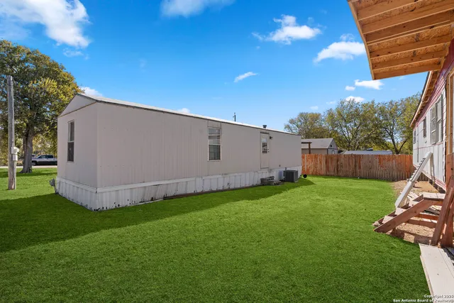 a view of a backyard with a garden