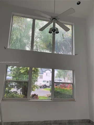 a kitchen with stainless steel appliances granite countertop a sink and a stove