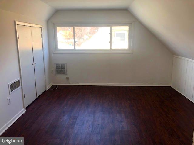 28 Violet Road Levittown, PA 19057 - Photo 11 of 16 an empty room with wooden floor and windows