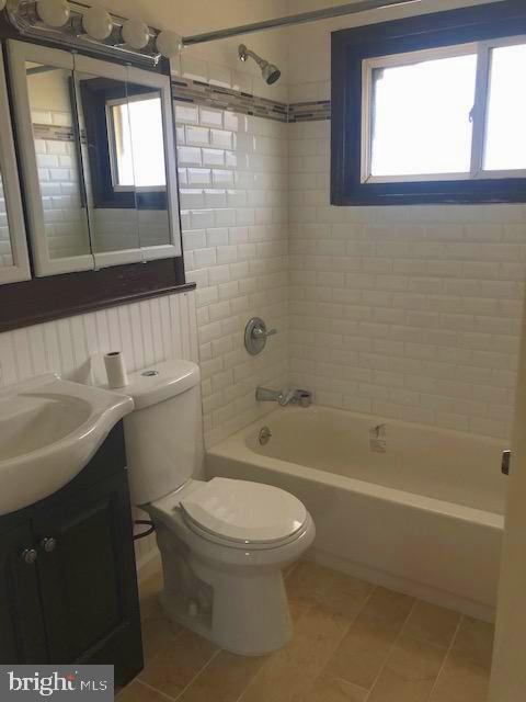 28 Violet Road Levittown, PA 19057 - Photo 14 of 16 a bathroom with a toilet a sink and bathtub