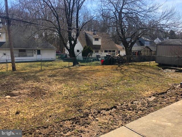 28 Violet Road Levittown, PA 19057 - Photo 15 of 16 a view of yard with tree in the background