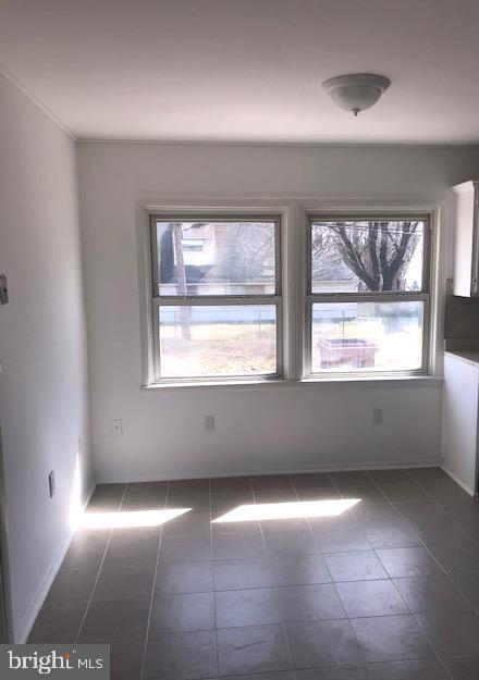 28 Violet Road Levittown, PA 19057 - Photo 6 of 16 an empty room with windows