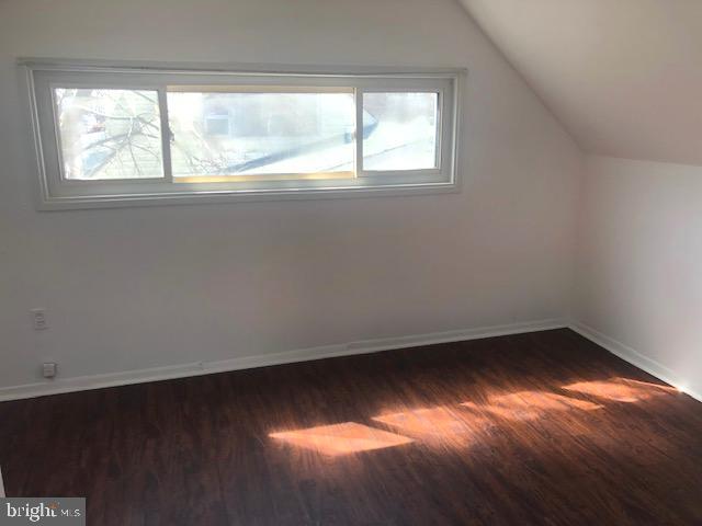 28 Violet Road Levittown, PA 19057 - Photo 10 of 16 an empty room with wooden floor and windows