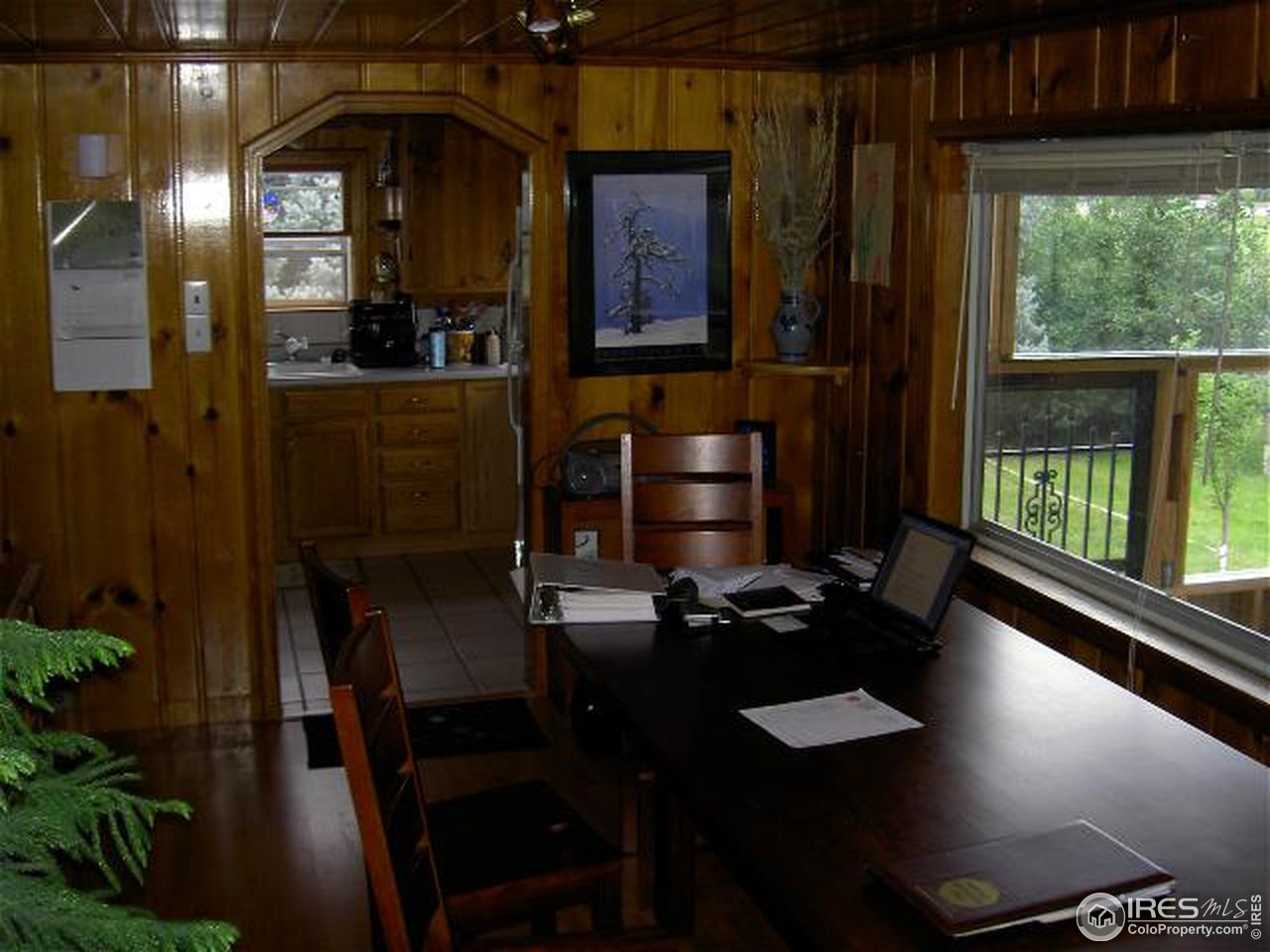 7071 Valmont Road Boulder, CO 80301 - Photo 3 of 9 a dining room with furniture and window