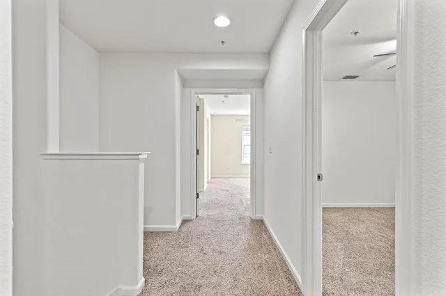 a view of a storage and utility room with window