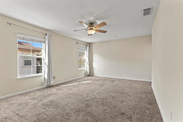 a view of a house with a street