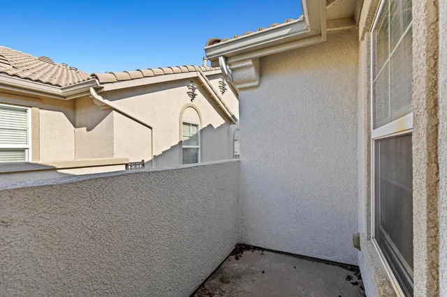 a view of a house with a roof deck