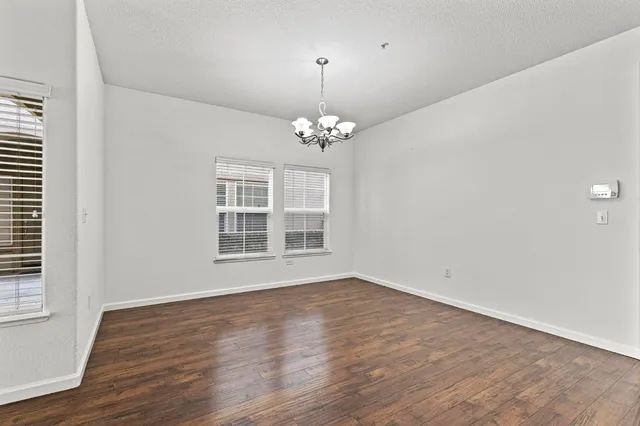 a view of kitchen with wooden floor