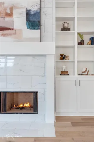 a fireplace with wooden floor