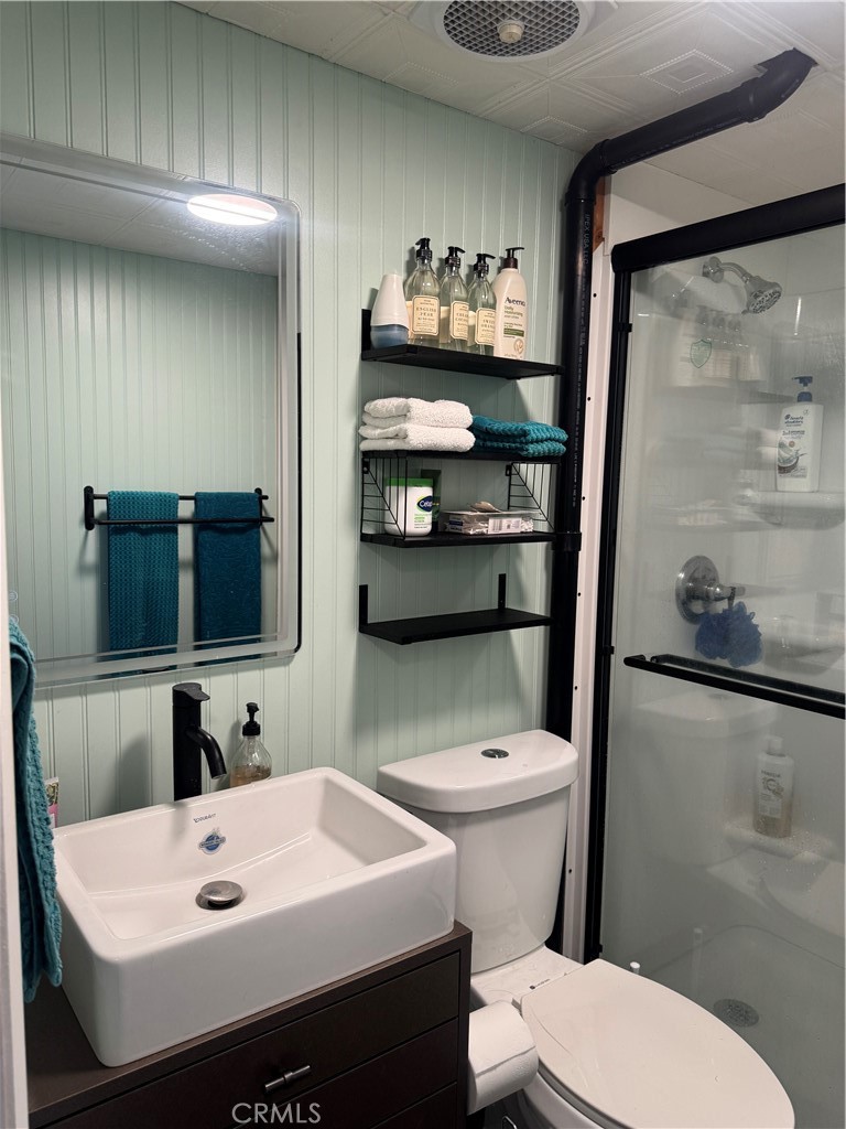 47 Fir Via Anaheim, CA 92801 - Photo 6 of 14 a bathroom with a sink a toilet and a mirror