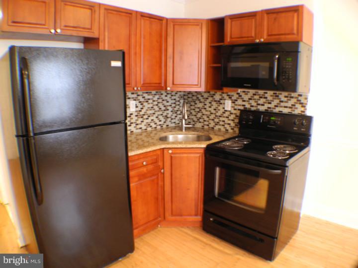 2233 Reed Street, Unit 1 Philadelphia, PA 19146 - Photo 1 of 8