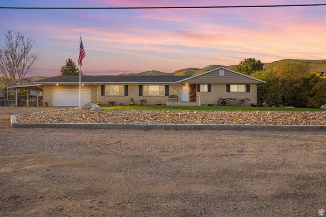 2420 West Old Hwy Road Morgan, UT 84050 - Photo 3 of 54 Single story home featuring brick siding, a garage, a carport, and driveway