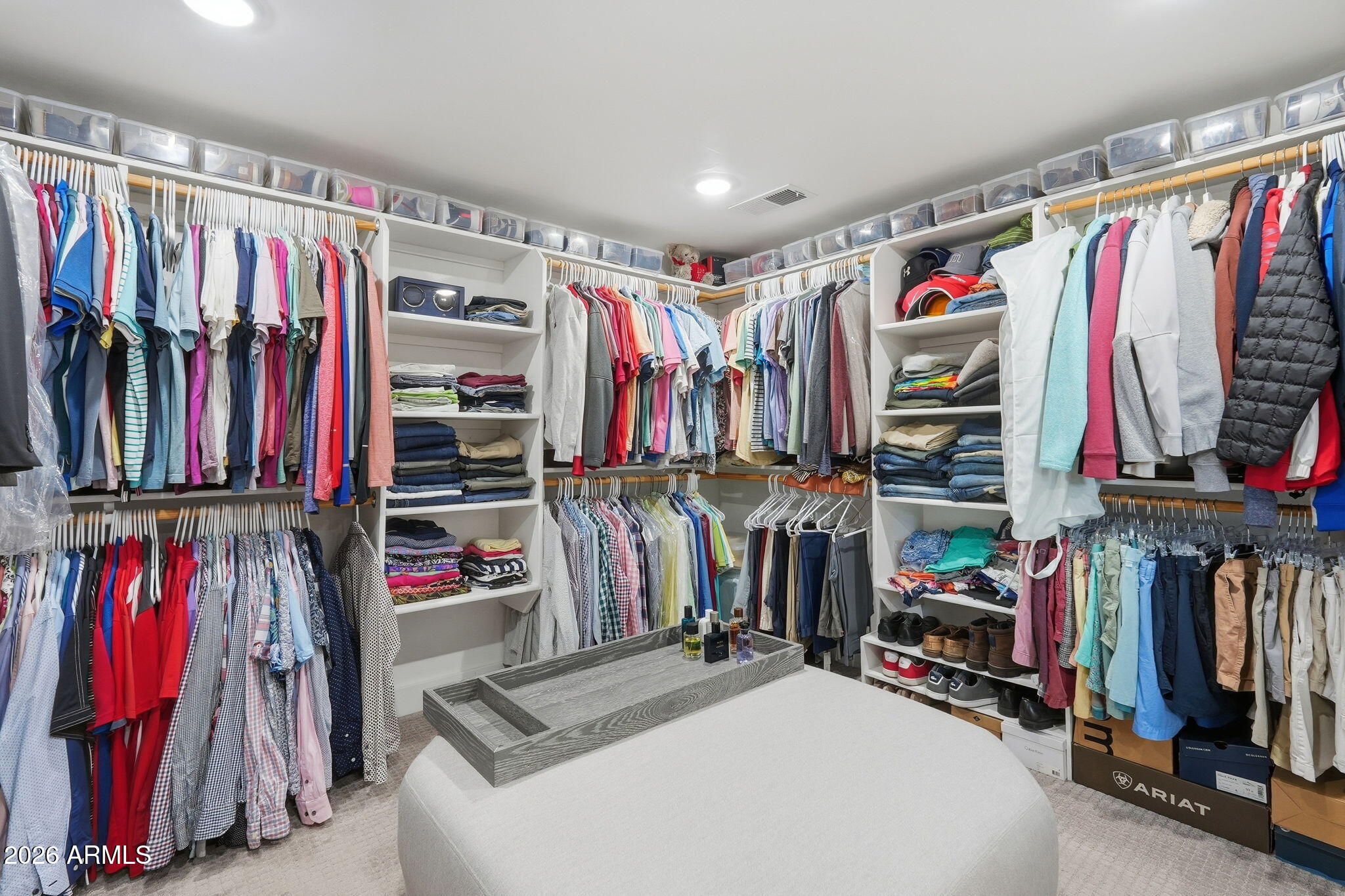 5149 North 34th Street Phoenix, AZ 85018 - Photo 35 of 70 a view of walk in closet with clothes