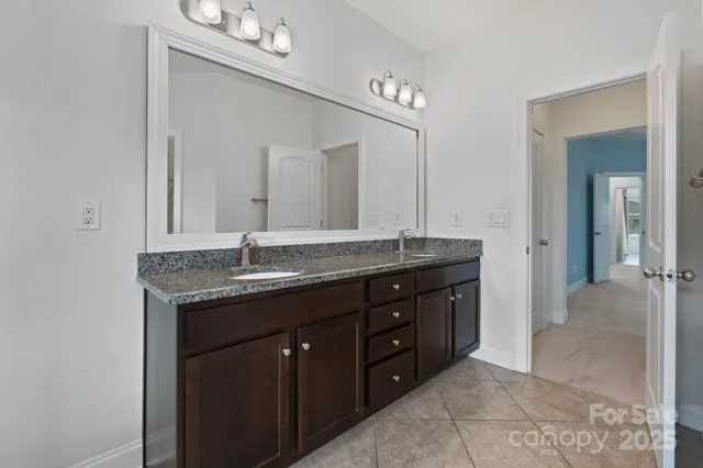 a view of a garage with rack and gym equipment