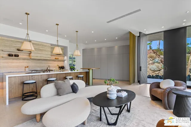 a outdoor living space with furniture and a fireplace