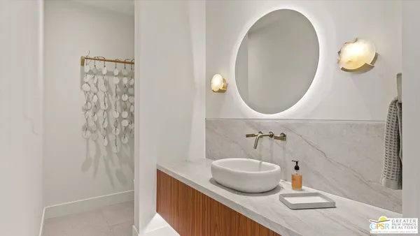 a view of a bathroom with a glass door