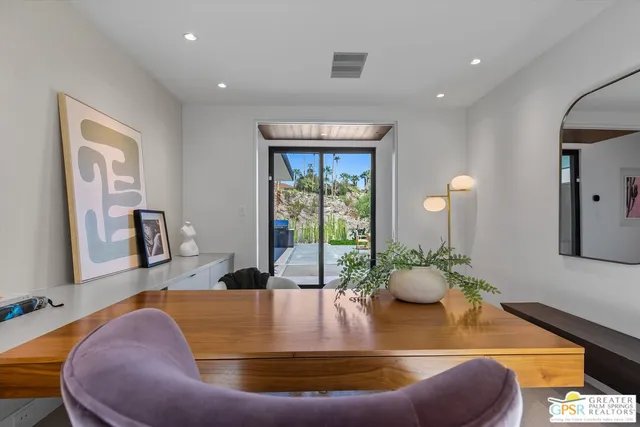 a view of a bathroom with a glass door