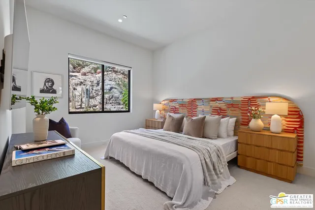 a bathroom with a toilet sink and shower