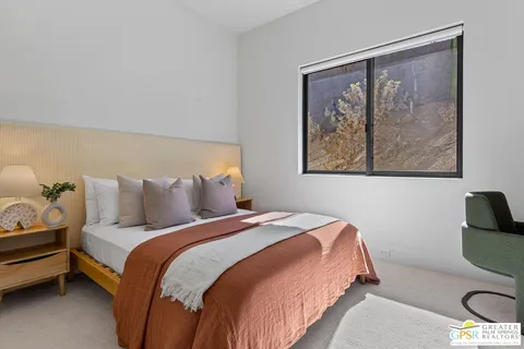 a bathroom with a sink a granite and shower