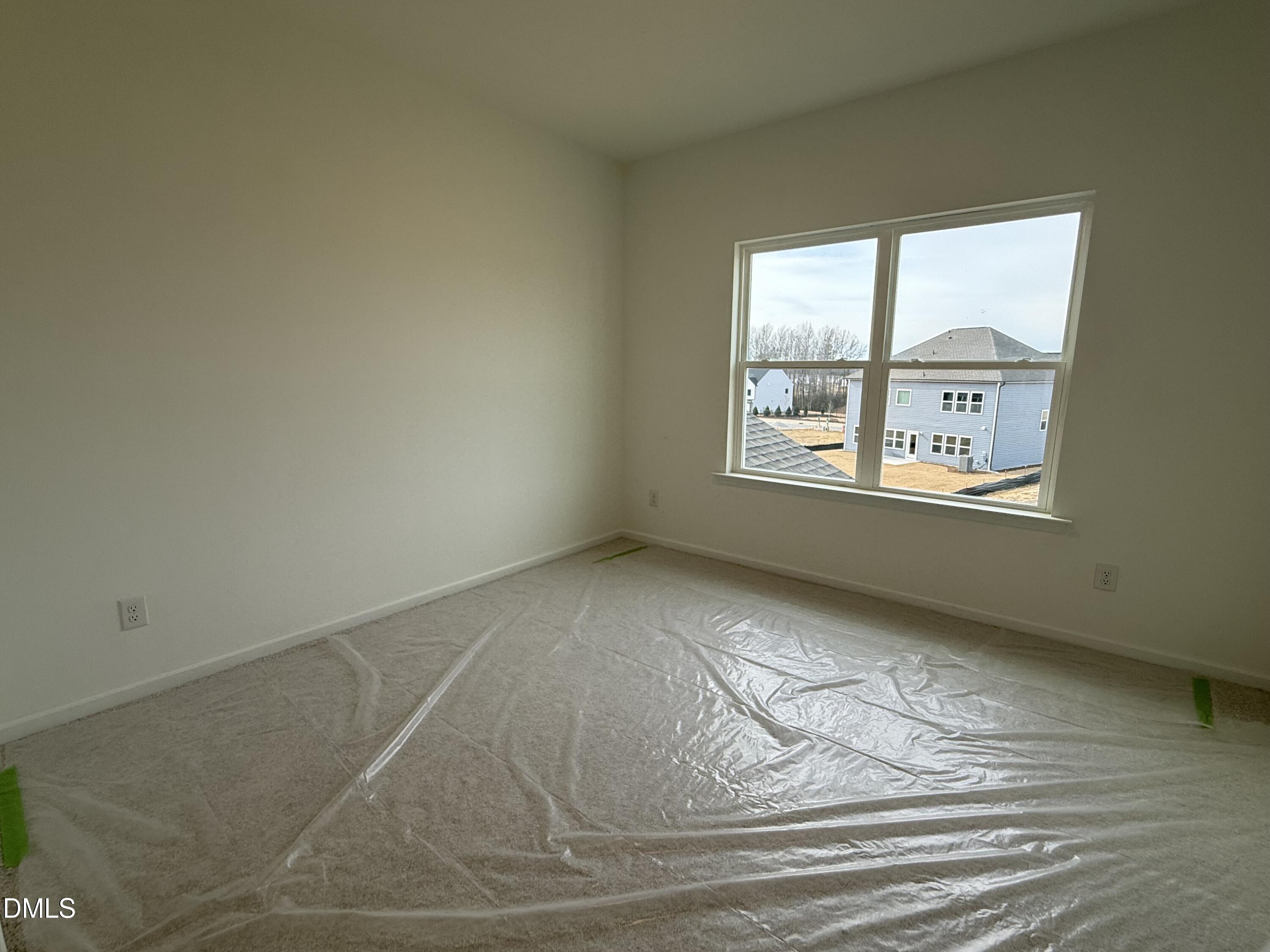 508 Contempo Court, Unit 39 Rolesville, NC 27571 - Photo 14 of 37 an empty room with a window
