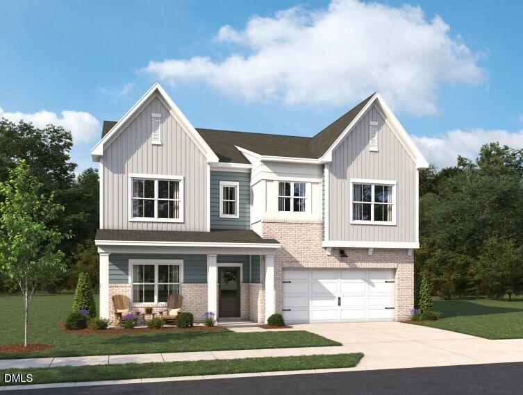 508 Contempo Court, Unit 39 Rolesville, NC 27571 - Photo 17 of 37 a front view of a house with a yard