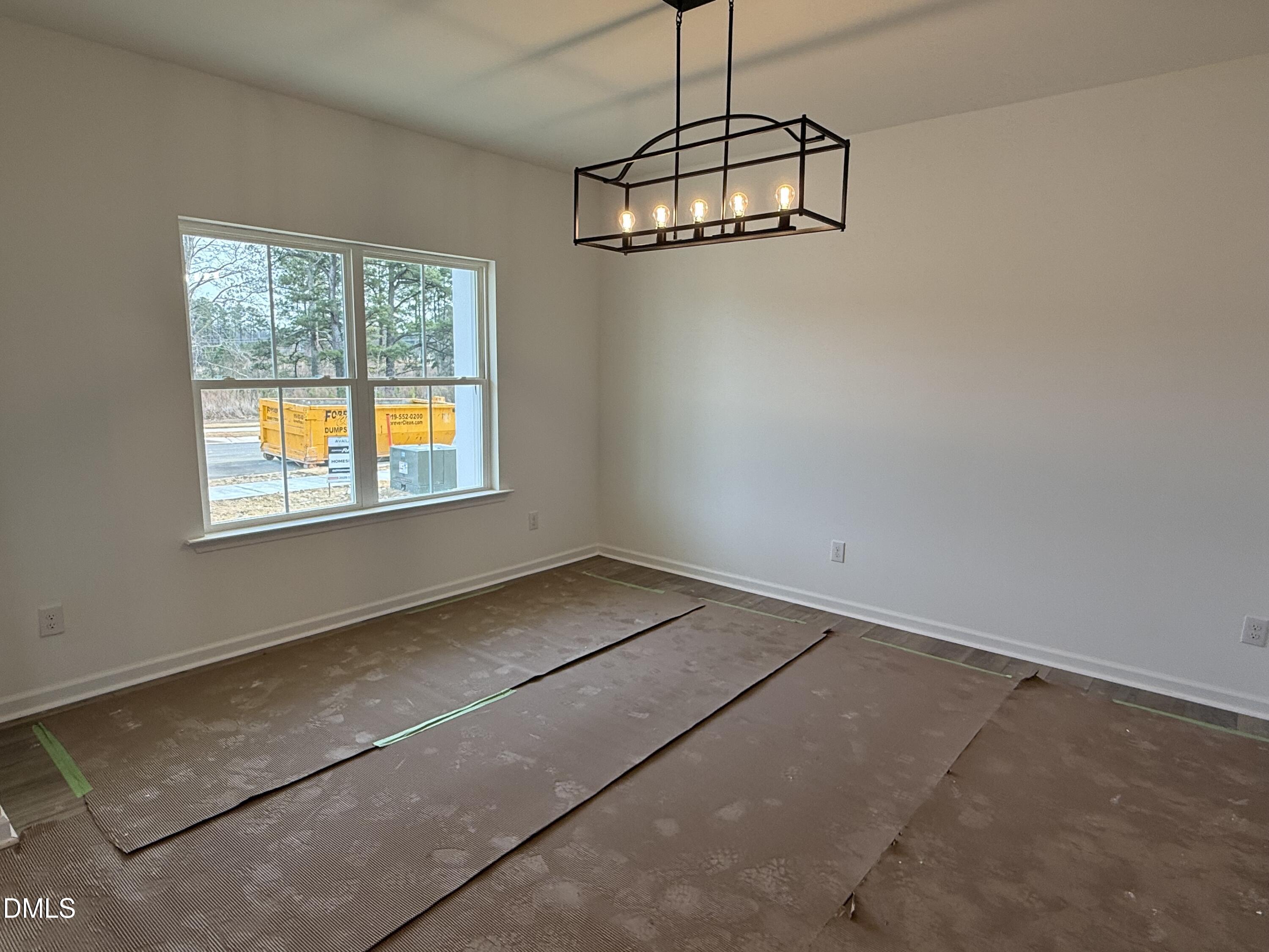 508 Contempo Court, Unit 39 Rolesville, NC 27571 - Photo 2 of 37 a view of an empty room with a window