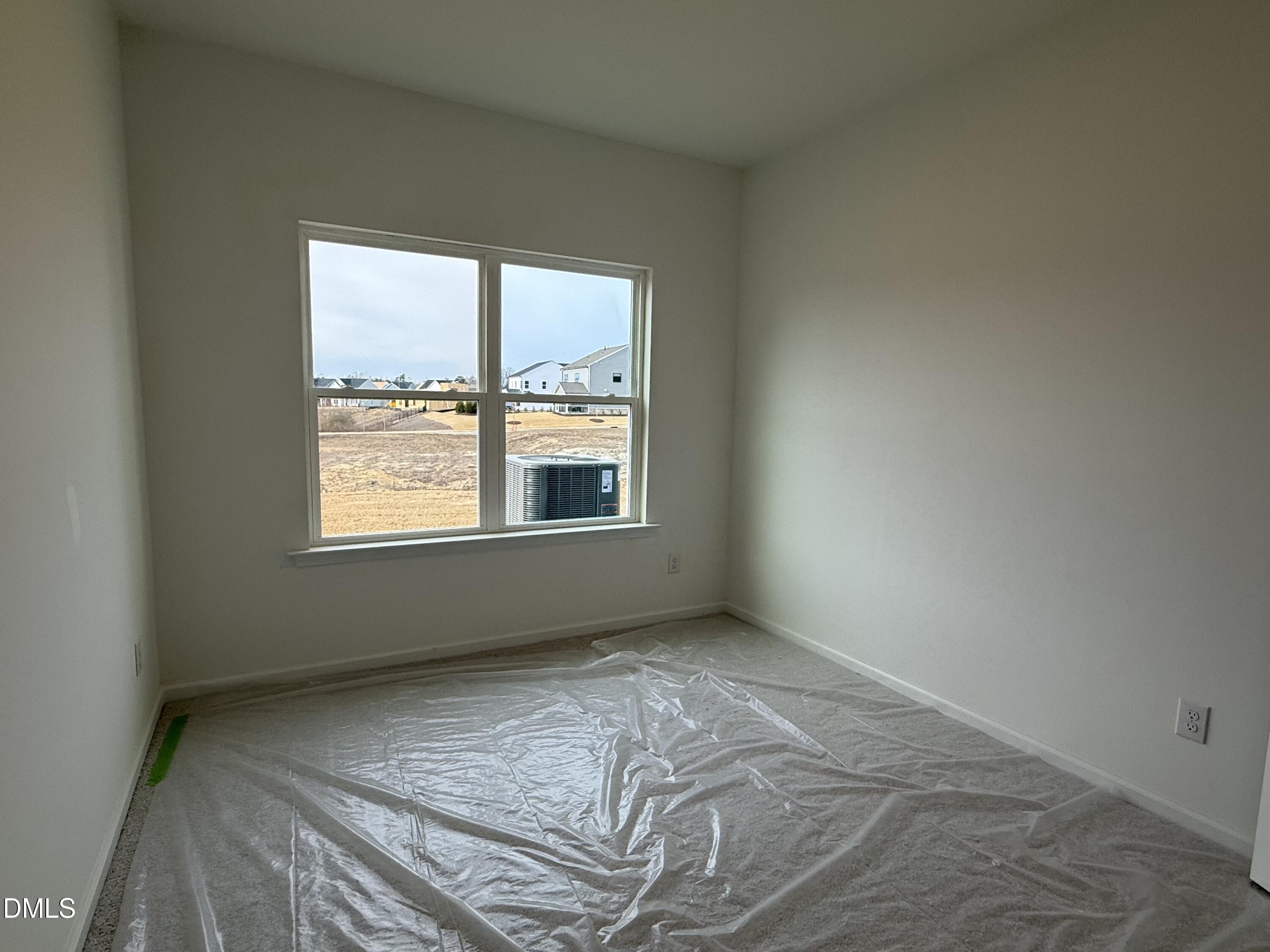 508 Contempo Court, Unit 39 Rolesville, NC 27571 - Photo 8 of 37 a view of an empty room with a window