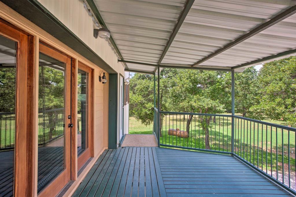a view of porch with wooden floor in outdoor space