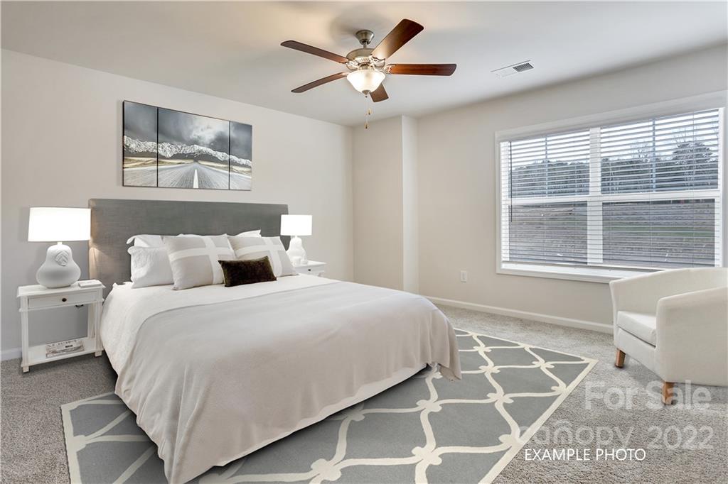 3738 Yorkshire Place, Unit 52 Terrell, NC 28682 - Photo 4 of 9 a bedroom with bed and a window