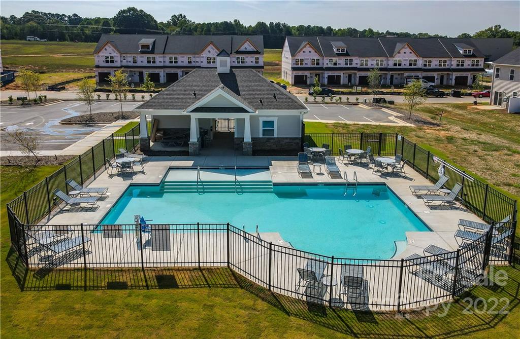 3738 Yorkshire Place, Unit 52 Terrell, NC 28682 - Photo 6 of 9 a aerial view of a house with swimming pool and ocean view