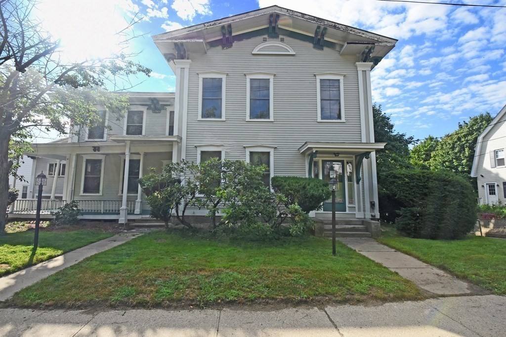 52 Central Street Gardner, MA 01440 - Photo 1 of 38 a front view of a house with a yard