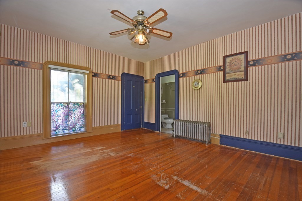 52 Central Street Gardner, MA 01440 - Photo 23 of 38 a view of an empty room with a window