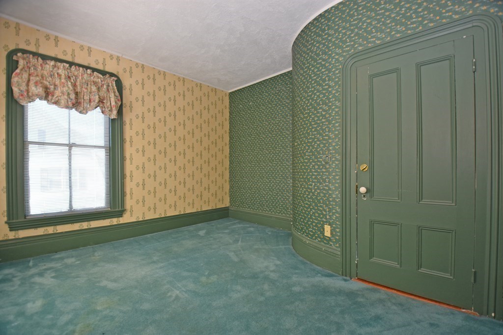 52 Central Street Gardner, MA 01440 - Photo 26 of 38 an empty room with windows